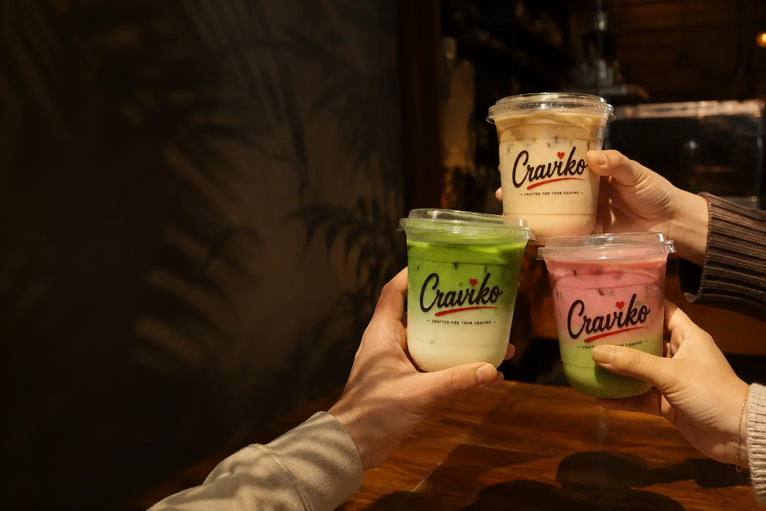 Friends sharing Craviko drinks